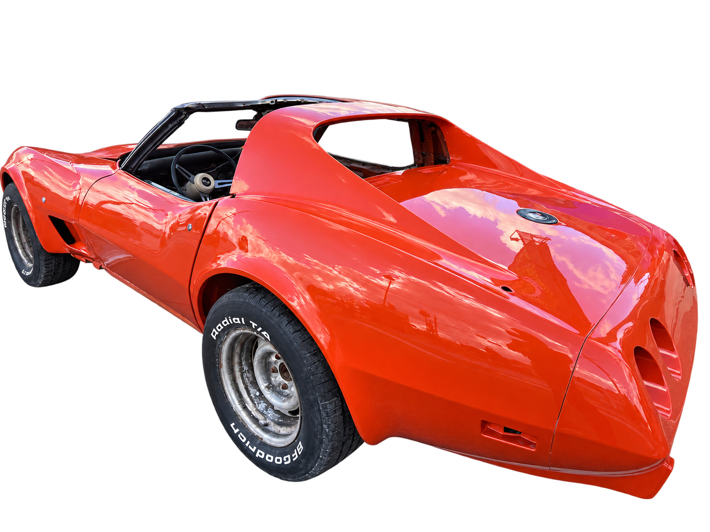 Orange Corvette paintwork in progress, isolated from an AB shop photo