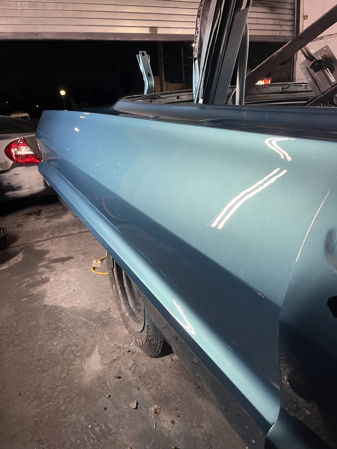 Close-up of teal painted bodywork